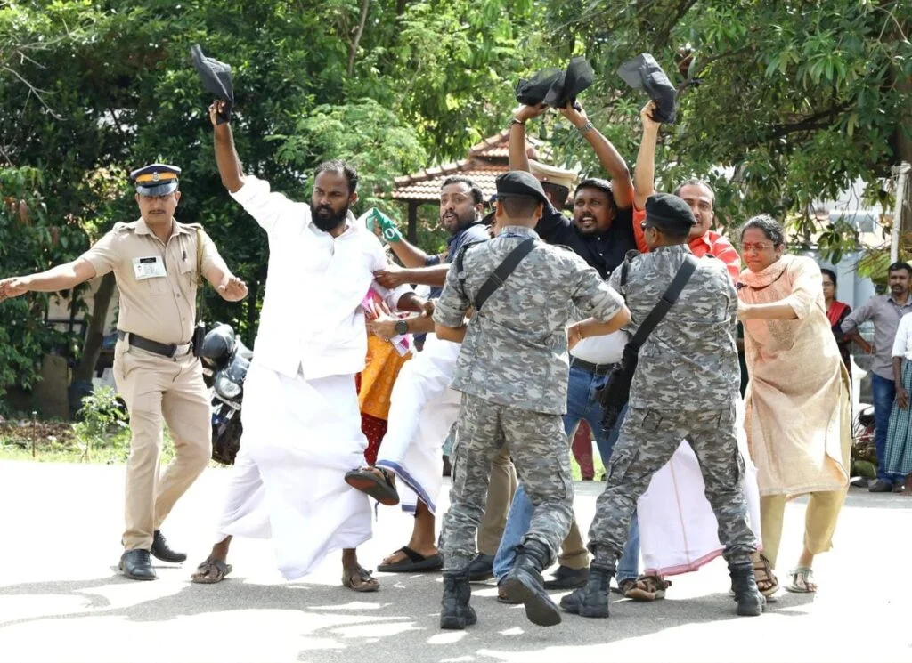 Police and Youth Congress protesters clash during Amit Shah visit